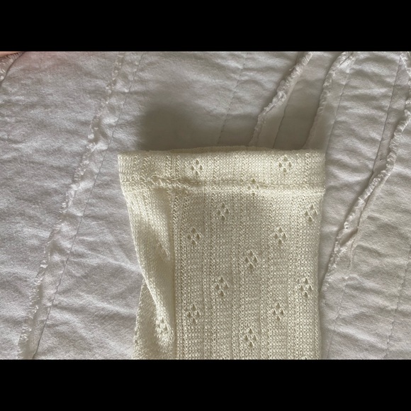 This is a white ruffled and detailed crop top - Picture 3 of 7